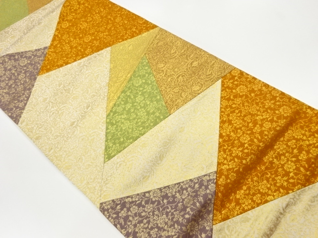 切り嵌めに花唐草模様織出し袋帯